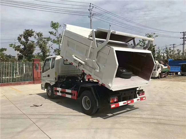 凱馬藍(lán)牌壓縮對接帶翼展垃圾車